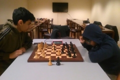 Haider Al-Sherufi vit mot Debasman Koley.